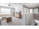 Open bonus room showcasing a sectional sofa and access to other rooms at 6429 Flag Stop Dr, Whitestown, IN 46075