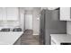 Kitchen with stainless steel refrigerator and white cabinetry at 6429 Flag Stop Dr, Whitestown, IN 46075