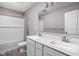 Bathroom with double vanity and a shower/tub combo at 6429 Flag Stop Dr, Whitestown, IN 46075