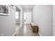 Bright entryway with hardwood floors and bench at 6429 Flag Stop Dr, Whitestown, IN 46075