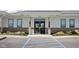 Modern amenity center with a welcoming entrance and landscaping at 6429 Flag Stop Dr, Whitestown, IN 46075