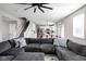 Open living room showcasing a large sectional sofa and kitchen views at 6429 Flag Stop Dr, Whitestown, IN 46075