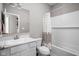 Clean bathroom with white vanity, bathtub, and shower at 6429 Flag Stop Dr, Whitestown, IN 46075