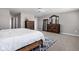 Bright bedroom with a king-size bed and ample closet space at 6429 Flag Stop Dr, Whitestown, IN 46075