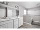 Double vanity bathroom with a soaking tub and separate shower at 6429 Flag Stop Dr, Whitestown, IN 46075