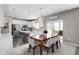 Eat-in kitchen with white cabinets, stainless steel appliances, and an island at 6429 Flag Stop Dr, Whitestown, IN 46075