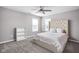 Charming bedroom with a tall headboard bed and bookshelf at 6429 Flag Stop Dr, Whitestown, IN 46075