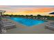 Relax by the resort-style pool at sunset at 6429 Flag Stop Dr, Whitestown, IN 46075