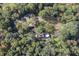 Aerial view of house and surrounding trees at 6470 Around The Hills Rd, Indianapolis, IN 46226