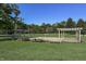 Outdoor bocce ball court with two pergolas and seating at 6470 Around The Hills Rd, Indianapolis, IN 46226