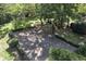 Private backyard basketball court with lush green surroundings at 6470 Around The Hills Rd, Indianapolis, IN 46226