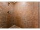 Shower stall with tan tile surround at 6470 Around The Hills Rd, Indianapolis, IN 46226