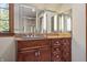 Elegant bathroom with granite vanity and large mirror at 6470 Around The Hills Rd, Indianapolis, IN 46226
