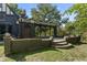 Stone patio with steps leading down to the yard, adjacent to home at 6470 Around The Hills Rd, Indianapolis, IN 46226