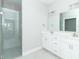 Bathroom boasts double vanity, large mirror, and a glass shower at 4435 W Preserve Pass, New Palestine, IN 46163