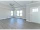 Spacious living room with gray flooring and neutral walls at 4435 W Preserve Pass, New Palestine, IN 46163