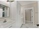 Bathroom featuring a vanity with white cabinets and a quartz countertop at 2843 Grandview Ln, Greenwood, IN 46143