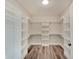 Bright walk-in closet with ample shelving and hanging space at 2843 Grandview Ln, Greenwood, IN 46143