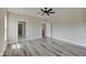 Spacious bedroom with wood-look flooring and access to a bathroom at 2843 Grandview Ln, Greenwood, IN 46143