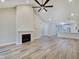 Open living room with high ceilings, fireplace and kitchen view at 2843 Grandview Ln, Greenwood, IN 46143