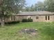 Brick home with deck and grassy backyard at 745 W Banta Rd, Indianapolis, IN 46217