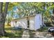 White storage shed with a single door at 9490 N 700 E, Indianapolis, IN 46259