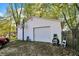 White detached garage with large door at 9490 N 700 E, Indianapolis, IN 46259