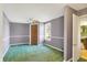 Cozy bedroom with green carpet and a view at 9490 N 700 E, Indianapolis, IN 46259