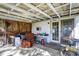 Covered back porch with seating and storage at 9490 N 700 E, Indianapolis, IN 46259