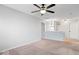 Bright bedroom featuring a ceiling fan and carpet at 10604 Pavilion Dr, Indianapolis, IN 46259