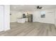 Open concept kitchen and living area with island and stainless steel appliances at 325 E Minnesota St, Indianapolis, IN 46225