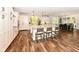 Modern kitchen featuring white cabinets, a large island, and stainless steel appliances at 11730 Ansley Ct, Zionsville, IN 46077