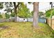 Large backyard with mature trees and two sheds at 214 Tippecanoe Dr, Noblesville, IN 46062