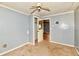 Small bedroom with grey walls and old carpet at 214 Tippecanoe Dr, Noblesville, IN 46062