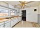 dated kitchen features worn countertops and cabinets at 214 Tippecanoe Dr, Noblesville, IN 46062