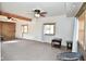 Spacious living room with ceiling fan and large windows at 11815 Nelson Rd, Martinsville, IN 46151