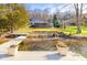 Aerial view of a house on a lake with a dock at 11741 W Grandview Dr, Columbus, IN 47201