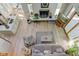 Open living space with a comfortable sitting area and fireplace at 6438 Pin Oak Dr, McCordsville, IN 46055