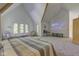 Spacious main bedroom with projector and large windows at 6438 Pin Oak Dr, McCordsville, IN 46055