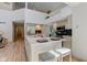 Modern kitchen with a large island and stainless steel appliances at 6438 Pin Oak Dr, McCordsville, IN 46055