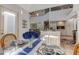 Bright dining area with glass table and wicker chairs, kitchen view at 6438 Pin Oak Dr, McCordsville, IN 46055