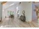 Bright dining room with hardwood floors and large windows offering natural light at 6438 Pin Oak Dr, McCordsville, IN 46055