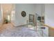 Spacious upper hallway with skylights, high ceilings and neutral carpet at 6438 Pin Oak Dr, McCordsville, IN 46055