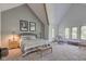 Spacious main bedroom with high ceilings, large windows and a sitting area at 6438 Pin Oak Dr, McCordsville, IN 46055