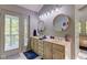Double vanity bathroom with walk-in shower and access to deck at 6438 Pin Oak Dr, McCordsville, IN 46055