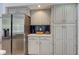 Modern kitchen features stainless steel appliances and updated cabinetry at 6438 Pin Oak Dr, McCordsville, IN 46055