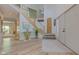Elegant entryway with staircase and hardwood floors at 6438 Pin Oak Dr, McCordsville, IN 46055