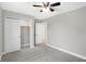 Bedroom with ceiling fan and double door closet at 7234 N Christopher Ln, Fairland, IN 46126