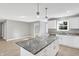 Island kitchen with granite countertops and stainless steel appliances at 7234 N Christopher Ln, Fairland, IN 46126