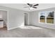 Bright bedroom with carpet flooring and a view of the backyard at 7234 N Christopher Ln, Fairland, IN 46126